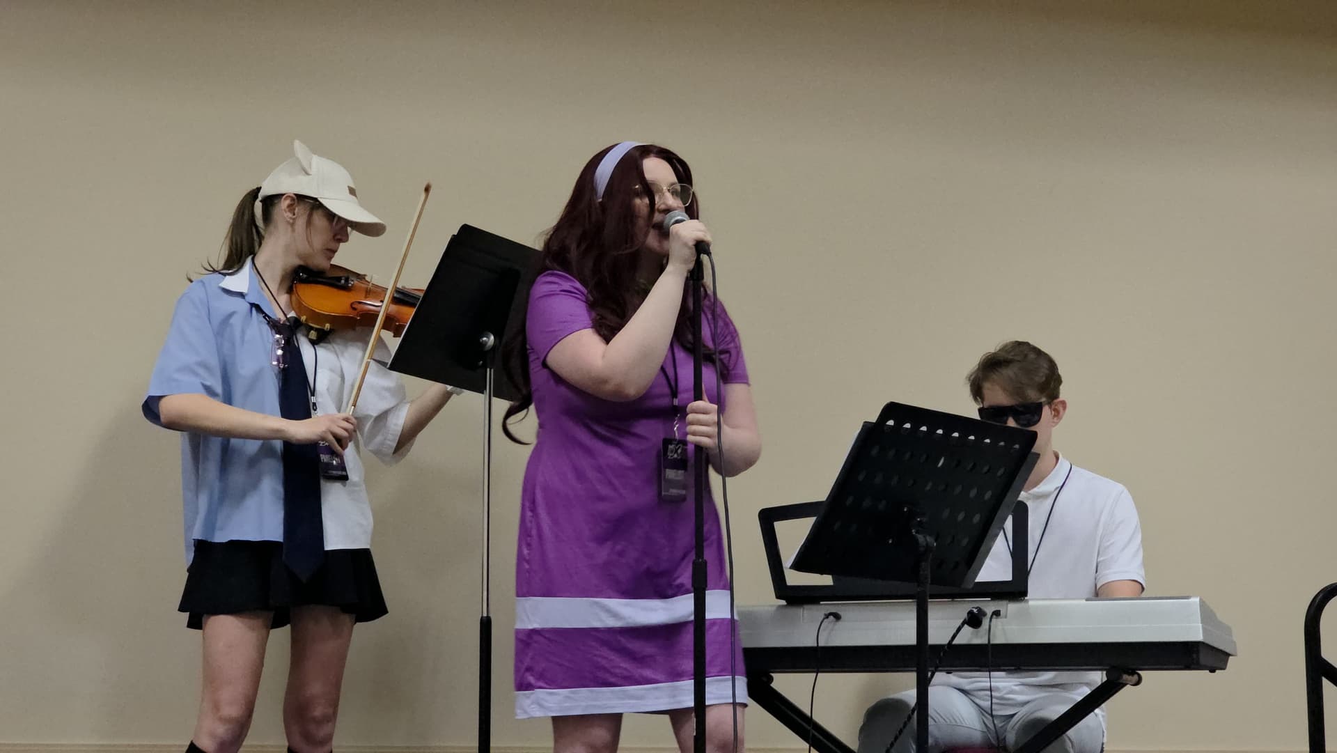 Madison Nickens and her siblings performing at FANX Salt Lake